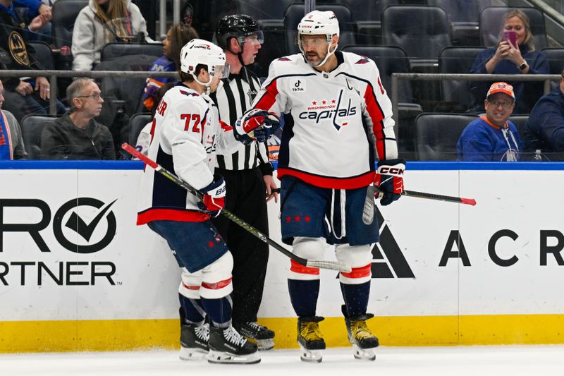 Nov 30, 2025; Elmont, New York, USA;  Washington Capitals left wing Alex Ovechkin (8) celebrates his goal with Washington Capitals left wing Anthony Beauvillier (72) against the New York Islanders during the third period at UBS Arena. Mandatory Credit: Dennis Schneidler-Imagn Images