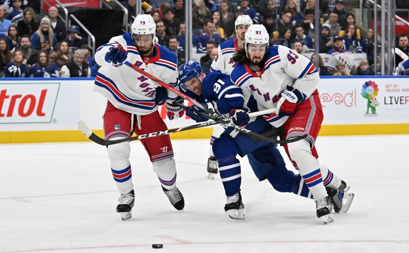 Mar. 2, 2024; Toronto, Ontario, CAN;   New York Rangers forward Mika Zibanejad (93) bodychecks Toronto Maple Leafs forward John Tavares (91) as defenseman K'Andre Miller (79) pursues the puck in the first period at Scotiabank Arena. Mandatory Credit: Dan Hamilton-USA TODAY Sports