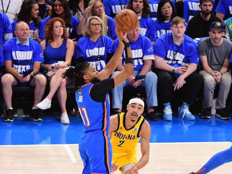 OKLAHOMA CITY, OK - JUNE 8: Isaiah Joe #11 of the Oklahoma City Thunder shoots a three point basket during the game against the Indiana Pacers during Game Two of the 2025 NBA Finals on June 8, 2025 at Paycom Center in Oklahoma City, Oklahoma. NOTE TO USER: User expressly acknowledges and agrees that, by downloading and or using this photograph, User is consenting to the terms and conditions of the Getty Images License Agreement. Mandatory Copyright Notice: Copyright 2025 NBAE (Photo by Adam Pantozzi/NBAE via Getty Images)