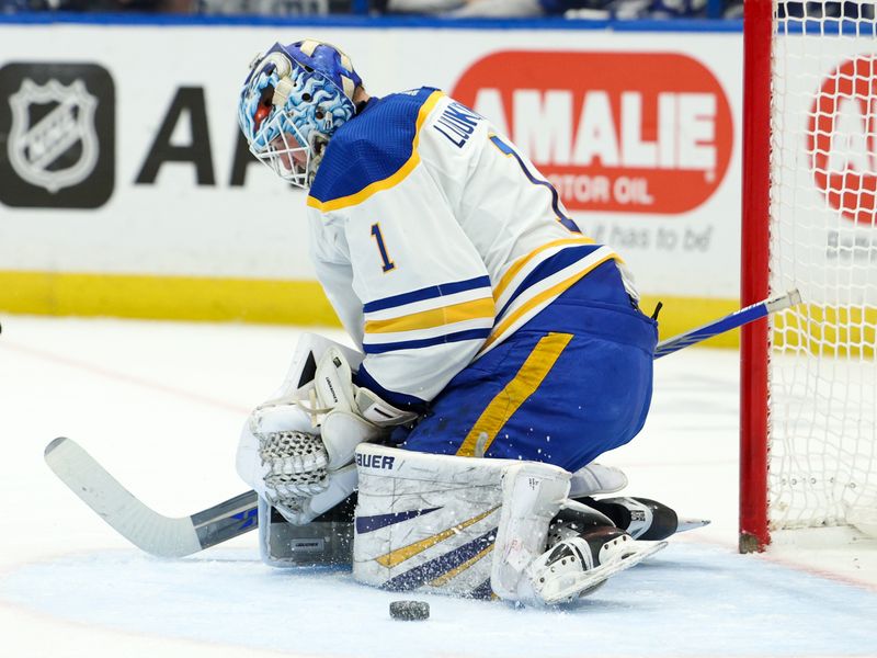 Feb 29, 2024; Tampa, Florida, USA;  Buffalo Sabres goaltender Ukko-Pekka Luukkonen (1) makes a save against the Tampa Bay Lightning in the first period at Amalie Arena. Mandatory Credit: Nathan Ray Seebeck-USA TODAY Sports