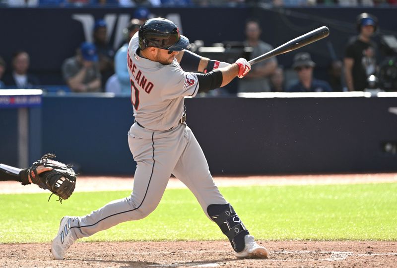 Aug 27, 2023; Toronto, Ontario, CAN;  Cleveland Indians right fielder Ramon Laureano (10) hits a two-run home run against the Toronto Blue Jays in the 11th inning at Rogers Centre. Mandatory Credit: Dan Hamilton-USA TODAY Sports