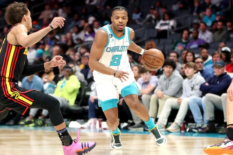 CHARLOTTE, NORTH CAROLINA - FEBRUARY 13: Dennis Smith Jr. #8 of the Charlotte Hornets drives to the basket during the first period of a basketball game against the Atlanta Hawks at Spectrum Center on February 13, 2023 in Charlotte, North Carolina. NOTE TO USER: User expressly acknowledges and agrees that, by downloading and or using this photograph, User is consenting to the terms and conditions of the Getty Images License Agreement. (Photo by David Jensen/Getty Images)