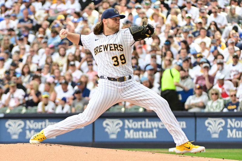 May 27, 2023; Milwaukee, Wisconsin, USA; Milwaukee Brewers pitcher Corbin Burnes (39) pitches against the San Francisco Giants in the first inning at American Family Field. Mandatory Credit: Benny Sieu-USA TODAY Sports