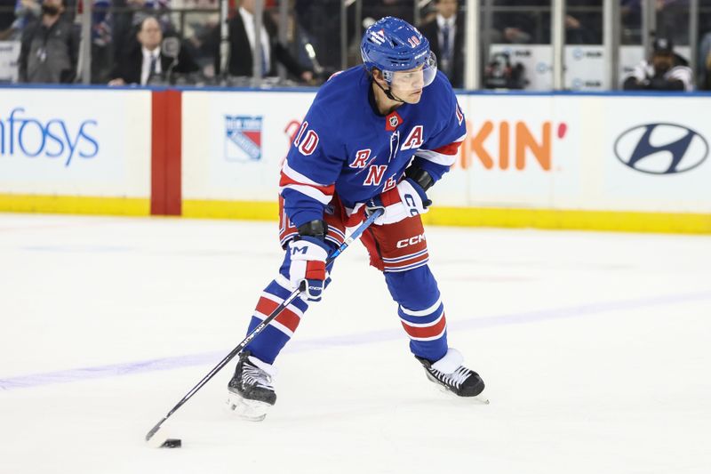 Feb 28, 2025; New York, New York, USA;  New York Rangers left wing Artemi Panarin (10) attempts a shot on goal in the third period against the Toronto Maple Leafs at Madison Square Garden. Mandatory Credit: Wendell Cruz-Imagn Images