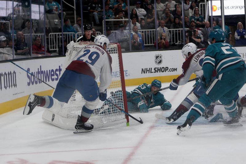 Nov 1, 2025; San Jose, California, USA; Colorado Avalanche center Nathan MacKinnon (29) scores a goal against the San Jose Sharks during the second period at SAP Center at San Jose. Mandatory Credit: Dennis Lee-Imagn Images
