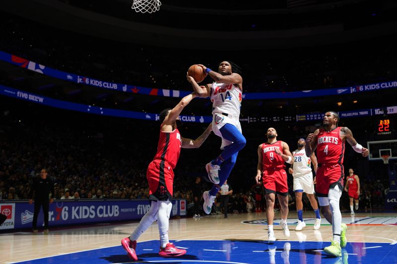 PHILADELPHIA, PA - NOVEMBER 27: Ricky Council IV #14 of the Philadelphia 76ers drives to the basket during the game against the Houston Rockets on November 27, 2024 at the Wells Fargo Center in Philadelphia, Pennsylvania NOTE TO USER: User expressly acknowledges and agrees that, by downloading and/or using this Photograph, user is consenting to the terms and conditions of the Getty Images License Agreement. Mandatory Copyright Notice: Copyright 2024 NBAE (Photo by Jesse D. Garrabrant/NBAE via Getty Images)