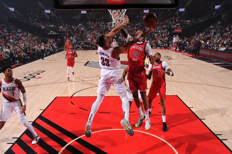 PORTLAND, OR - OCTOBER 27: Toumani Camara #33 of the Portland Trail Blazers drives to the basket during the game against the New Orleans Pelicans on October 27, 2024 at the Moda Center Arena in Portland, Oregon. NOTE TO USER: User expressly acknowledges and agrees that, by downloading and or using this photograph, user is consenting to the terms and conditions of the Getty Images License Agreement. Mandatory Copyright Notice: Copyright 2024 NBAE (Photo by Cameron Browne/NBAE via Getty Images)