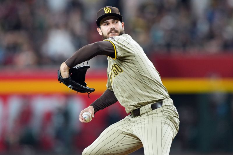 May 3, 2024; Phoenix, Arizona, USA; San Diego Padres pitcher Dylan Cease (84) pitches against the Arizona Diamondbacks during the fourth inning at Chase Field. Mandatory Credit: Joe Camporeale-USA TODAY Sports