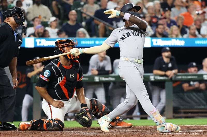 Sep 19, 2025; Baltimore, Maryland, USA; New York Yankees second baseman Jazz Chisholm Jr. (13) hits a home run during the seventh inning against the Baltimore Orioles at Oriole Park at Camden Yards. Mandatory Credit: Daniel Kucin Jr.-Imagn Images
