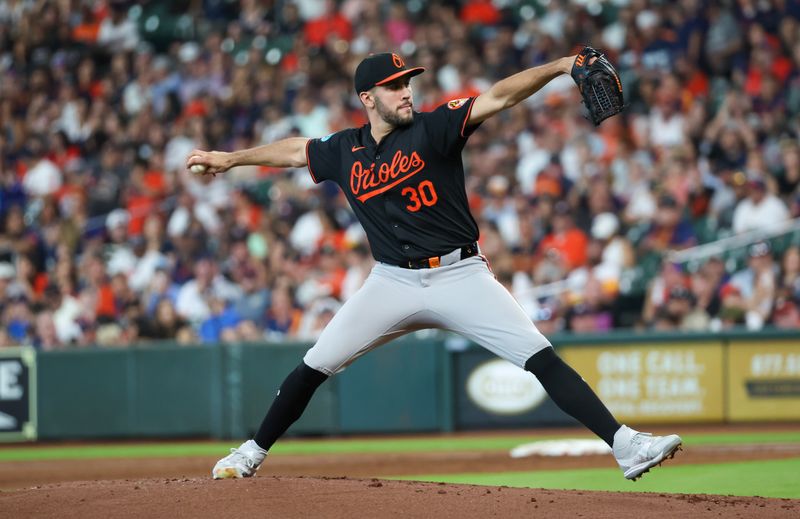 Jun 21, 2024; Houston, Texas, USA; Baltimore Orioles starting pitcher Grayson Rodriguez (30) pitches against the Houston Astros in the first inning at Minute Maid Park. Mandatory Credit: Thomas Shea-USA TODAY Sports