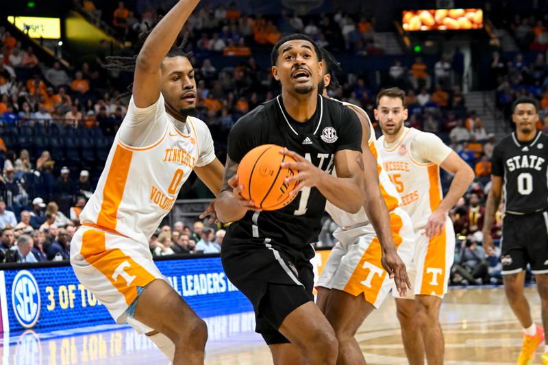 Mar 15, 2024; Nashville, TN, USA; Mississippi State Bulldogs forward Tolu Smith (1) drives lane against the Tennessee Volunteers during the first half at Bridgestone Arena. Mandatory Credit: Steve Roberts-USA TODAY Sports