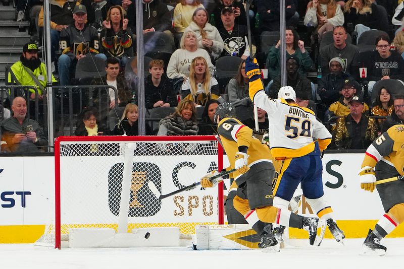 Dec 31, 2025; Las Vegas, Nevada, USA; Nashville Predators left wing Michael Bunting (58) celebrates after scoring a goal against the Vegas Golden Knights during the second period at T-Mobile Arena. Mandatory Credit: Stephen R. Sylvanie-Imagn Images