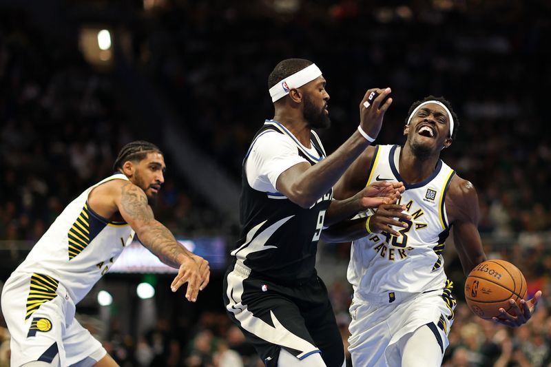 MILWAUKEE, WISCONSIN - NOVEMBER 22: Pascal Siakam #43 of the Indiana Pacers is fouled by Bobby Portis #9 of the Milwaukee Bucks during the first half of a game in the NBA Emirates Cup at Fiserv Forum on November 22, 2024 in Milwaukee, Wisconsin. NOTE TO USER: User expressly acknowledges and agrees that, by downloading and or using this photograph, User is consenting to the terms and conditions of the Getty Images License Agreement. (Photo by Stacy Revere/Getty Images)