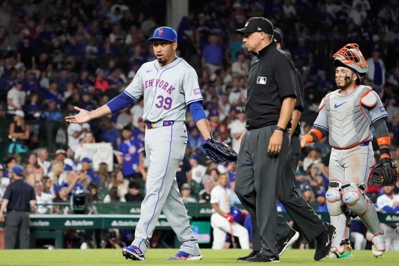 Jun 23, 2024; Chicago, Illinois, USA; New York Mets pitcher Edwin Díaz (39) is ejected during the ninth inning against the Chicago Cubs at Wrigley Field. Mandatory Credit: David Banks-USA TODAY Sports