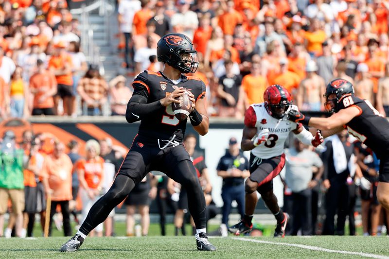 Sep 16, 2023; Corvallis, Oregon, USA; Oregon State Beavers quarterback DJ Uiagalelei (5) looks to throw during the first half against the San Diego State Aztecs at Reser Stadium. Mandatory Credit: Soobum Im-USA TODAY Sports