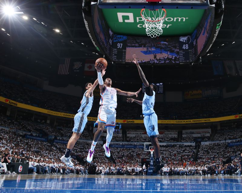 OKLAHOMA CITY, OK - APRIL 20: Jalen Williams #8 of the Oklahoma City Thunder drives to the basket during the game against the Memphis Grizzlies during Round 1 Game 1 of the 2025 NBA Playoffs on April 20, 2025 at Paycom Center in Oklahoma City, Oklahoma. NOTE TO USER: User expressly acknowledges and agrees that, by downloading and or using this photograph, User is consenting to the terms and conditions of the Getty Images License Agreement. Mandatory Copyright Notice: Copyright 2025 NBAE (Photo by Joe Murphy/NBAE via Getty Images)