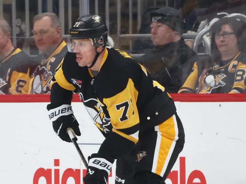 Mar 21, 2026; Pittsburgh, Pennsylvania, USA;  Pittsburgh Penguins center Evgeni Malkin (71) handles the puck against the Winnipeg Jets during the second period at PPG Paints Arena. Mandatory Credit: Charles LeClaire-Imagn Images