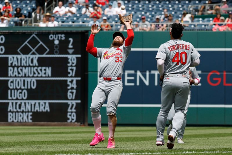 May 11, 2025; Washington, District of Columbia, USA; St. Louis Cardinals second base Brendan Donovan (33) catches a pop up hit by Washington Nationals second base Luis García Jr. (not pictured) during the second inning at Nationals Park. Mandatory Credit: Geoff Burke-Imagn Images