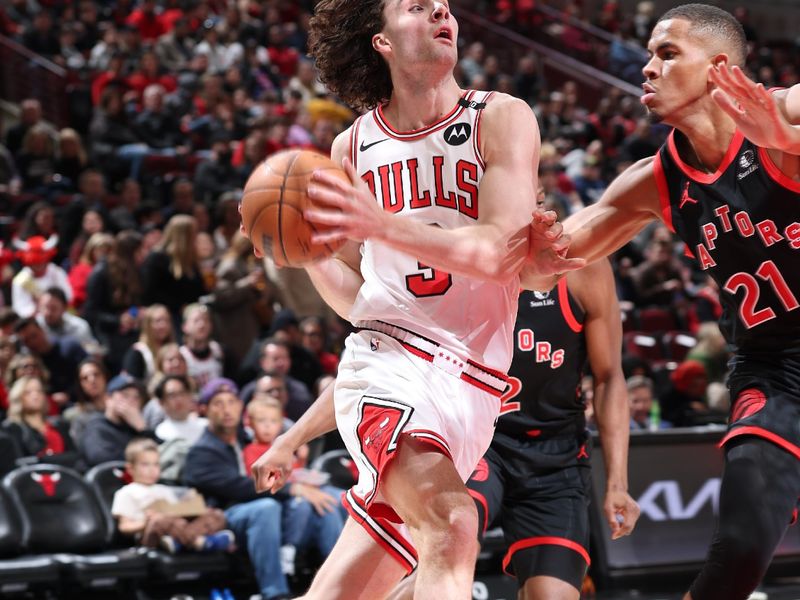 CHICAGO, IL - FEBRUARY 28:  Josh Giddey #3 of the Chicago Bulls drives to the basket during the game against the Toronto Raptors on February 28, 2025 at United Center in Chicago, Illinois. NOTE TO USER: User expressly acknowledges and agrees that, by downloading and or using this photograph, User is consenting to the terms and conditions of the Getty Images License Agreement. Mandatory Copyright Notice: Copyright 2025 NBAE (Photo by Jeff Haynes/NBAE via Getty Images)