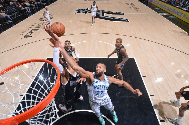 SAN ANTONIO, TX - JANUARY 27: Rudy Gobert #27 of the Minnesota Timberwolves drives to the basket during the game against the San Antonio Spurs on January 27, 2024 at the Frost Bank Center in San Antonio, Texas. NOTE TO USER: User expressly acknowledges and agrees that, by downloading and or using this photograph, user is consenting to the terms and conditions of the Getty Images License Agreement. Mandatory Copyright Notice: Copyright 2024 NBAE (Photos by Michael Gonzales/NBAE via Getty Images)