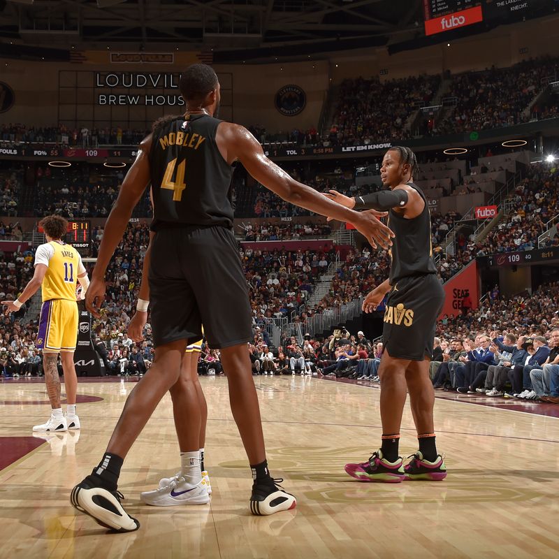 CLEVELAND, OH - OCTOBER 30: Evan Mobley #4 and Isaac Okoro #35 of the Cleveland Cavaliers high five during the game against the Los Angeles Lakers on October 30, 2024 at Rocket Mortgage FieldHouse in Cleveland, Ohio. NOTE TO USER: User expressly acknowledges and agrees that, by downloading and/or using this Photograph, user is consenting to the terms and conditions of the Getty Images License Agreement. Mandatory Copyright Notice: Copyright 2024 NBAE (Photo by David Liam Kyle/NBAE via Getty Images)