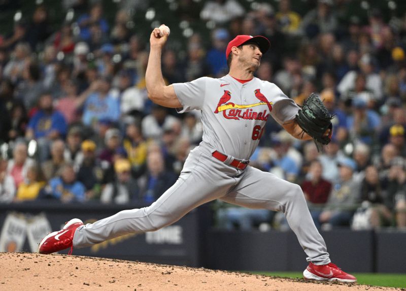 Sep 28, 2023; Milwaukee, Wisconsin, USA; St. Louis Cardinals relief pitcher Jacob Barnes (61) delivers a pitch against the Milwaukee Brewers in the seventh inning at American Family Field. Mandatory Credit: Michael McLoone-USA TODAY Sports