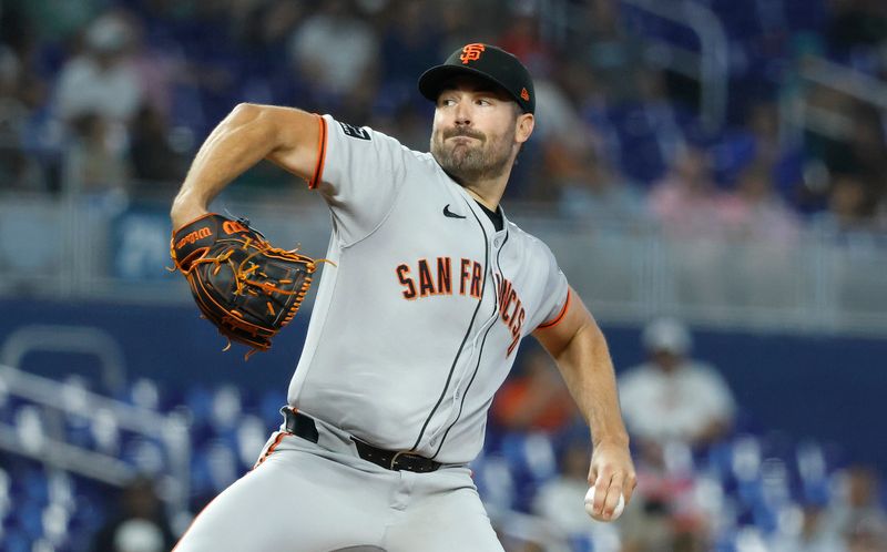 May 31, 2025; Miami, Florida, USA;  San Francisco Giants relief pitcher Kyle Harrison (45) pitches against the Miami Marlins during the first inning at loanDepot Park. Mandatory Credit: Rhona Wise-Imagn Images