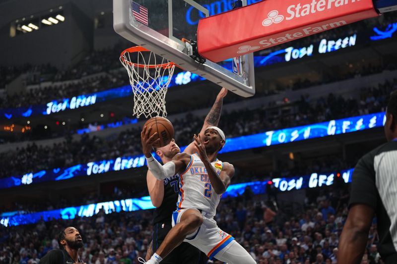 DALLAS, TX - MAY 18: Shai Gilgeous-Alexander #2 of the Oklahoma City Thunder drives to the basket during the game against the Dallas Mavericks during Round 2 Game 6 of the 2024 NBA Playoffs on May 18, 2024 at the American Airlines Center in Dallas, Texas. NOTE TO USER: User expressly acknowledges and agrees that, by downloading and or using this photograph, User is consenting to the terms and conditions of the Getty Images License Agreement. Mandatory Copyright Notice: Copyright 2024 NBAE (Photo by Cooper Neill/NBAE via Getty Images)