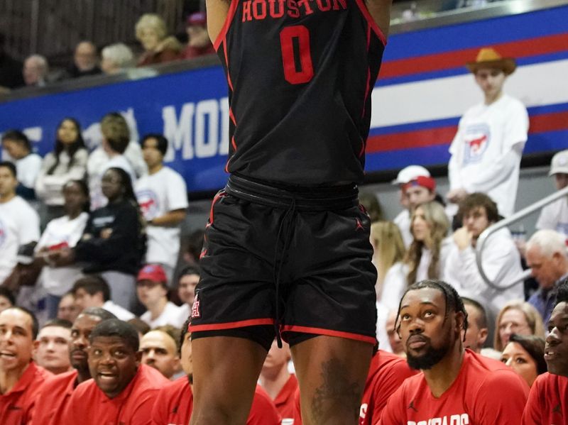 Feb 16, 2023; Dallas, Texas, USA; Houston Cougars guard Marcus Sasser (0) shoots the 3-point shot against the Southern Methodist Mustangs during the second half at Moody Coliseum. Mandatory Credit: Raymond Carlin III-USA TODAY Sports