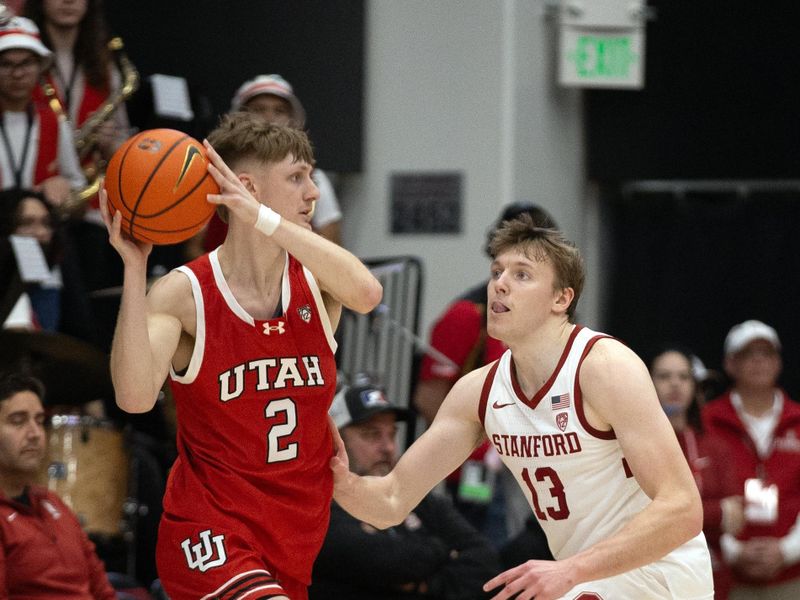 Jan 14, 2024; Stanford, California, USA; Utah Utes guard Cole Bajema (2) looks to pass around Stanford Cardinal guard Michael Jones (13) during the second half at Maples Pavilion. Mandatory Credit: D. Ross Cameron-USA TODAY Sports