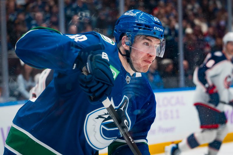 Nov 8, 2025; Vancouver, British Columbia, CAN; Vancouver Canucks forward Drew O'Connor (18) skates against the Columbus Blue Jackets in the second period at Rogers Arena. Mandatory Credit: Bob Frid-Imagn Images