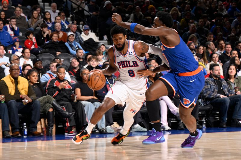 PHILADELPHIA, PA - JANUARY 15: Paul George #8 of the Philadelphia 76ers drives to the basket during the game against the New York Knicks on January 15, 2025 at the Wells Fargo Center in Philadelphia, Pennsylvania NOTE TO USER: User expressly acknowledges and agrees that, by downloading and/or using this Photograph, user is consenting to the terms and conditions of the Getty Images License Agreement. Mandatory Copyright Notice: Copyright 2025 NBAE (Photo by David Dow/NBAE via Getty Images)