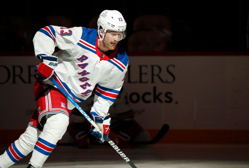 Nov 22, 2023; Pittsburgh, Pennsylvania, USA; New York Rangers left wing Alexis Lafreniere (13) takes the ice to play the Pittsburgh Penguins at PPG Paints Arena. Mandatory Credit: Charles LeClaire-USA TODAY Sports