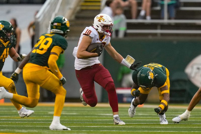 Oct 28, 2023; Waco, Texas, USA;  Iowa State Cyclones tight end Benjamin Brahmer (18) is tackled by Baylor Bears safety Devyn Bobby (28) after a catch during the second half at McLane Stadium. Mandatory Credit: Chris Jones-USA TODAY Sports