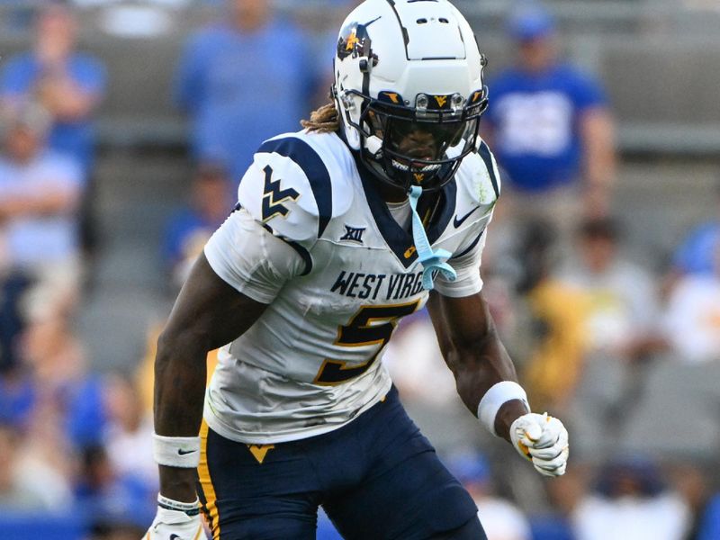 Sep 14, 2024; Pittsburgh, Pennsylvania, USA; West Virginia Mountaineers wide receiver Jaden Bray (5) runs against the Pittsburgh Panthers during the fourth quarter at Acrisure Stadium. Mandatory Credit: Barry Reeger-Image Images