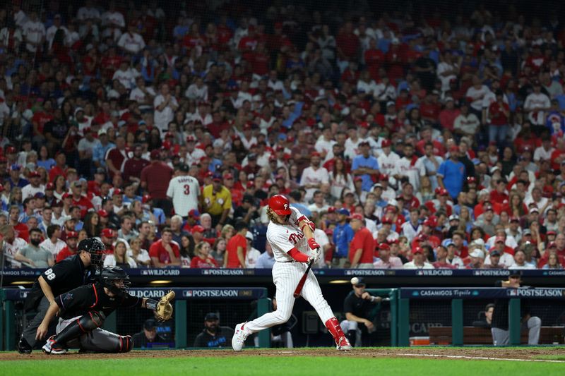 Oct 4, 2023; Philadelphia, Pennsylvania, USA; Philadelphia Phillies first baseman Alec Bohm (28) hits a double against the Miami Marlins during the sixth inning for game two of the Wildcard series for the 2023 MLB playoffs at Citizens Bank Park. Mandatory Credit: Bill Streicher-USA TODAY Sports