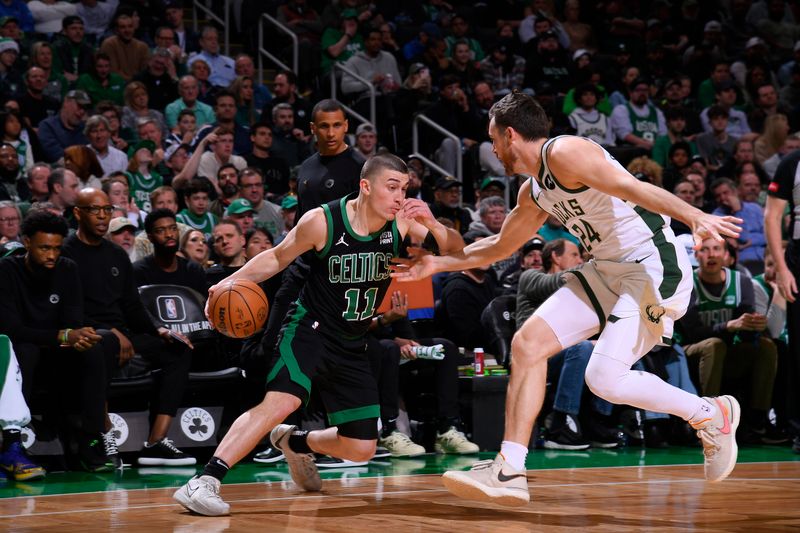 BOSTON, MA - MARCH 20: Payton Pritchard #11 of the Boston Celtics handles the ball during the game against the Milwaukee Bucks on March 20, 2024 at the TD Garden in Boston, Massachusetts. NOTE TO USER: User expressly acknowledges and agrees that, by downloading and or using this photograph, User is consenting to the terms and conditions of the Getty Images License Agreement. Mandatory Copyright Notice: Copyright 2024 NBAE  (Photo by Brian Babineau/NBAE via Getty Images)