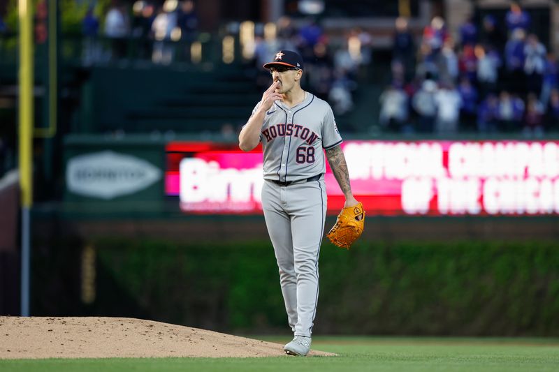 Apr 23, 2024; Chicago, Illinois, USA; Houston Astros starting pitcher J.P. France (68) reacts after giving up a three-run home run to Chicago Cubs outfielder Mike Tauchman during the first inning at Wrigley Field. Mandatory Credit: Kamil Krzaczynski-USA TODAY Sports