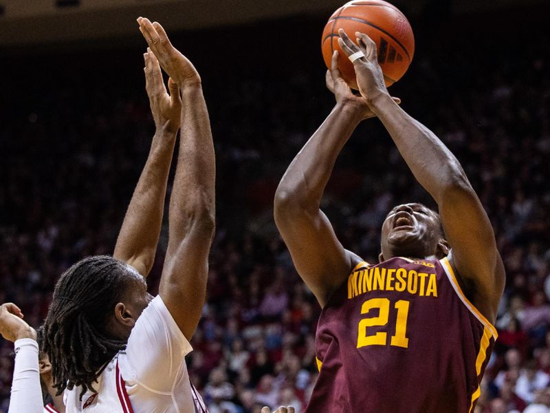 Jan 12, 2024; Bloomington, Indiana, USA; Minnesota Golden Gophers forward Pharrel Payne (21) shoots the ball while Indiana Hoosiers forward Mackenzie Mgbako (21) defends in the second half at Simon Skjodt Assembly Hall. Mandatory Credit: Trevor Ruszkowski-USA TODAY Sports