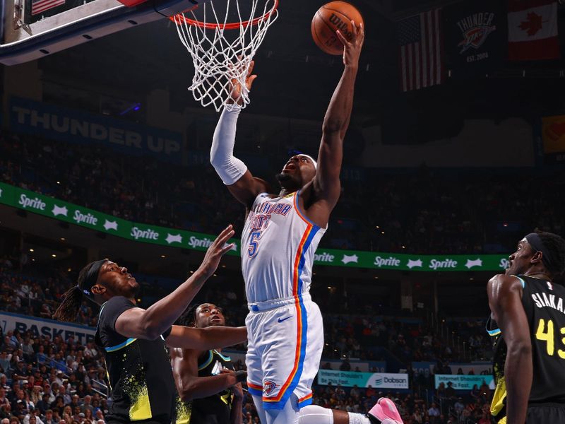OKLAHOMA CITY, OK - MARCH 12: Luguentz Dort #5 of the Oklahoma City Thunder drives to the basket during the game against the Indiana Pacers on March 12, 2024 at Paycom Arena in Oklahoma City, Oklahoma. NOTE TO USER: User expressly acknowledges and agrees that, by downloading and or using this photograph, User is consenting to the terms and conditions of the Getty Images License Agreement. Mandatory Copyright Notice: Copyright 2024 NBAE (Photo by Zach Beeker/NBAE via Getty Images)