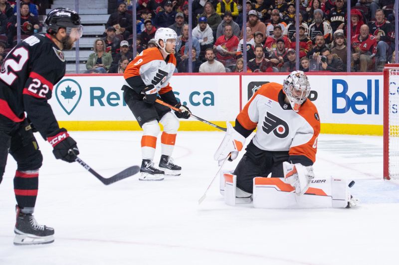 Oct 23, 2025; Ottawa, Ontario, CAN; Ottawa Senators right wing Michael Amadio (22) scores against Philadelphia Flyers goalie Dan Vladar (80) in the first period at the Canadian Tire Centre. Mandatory Credit: Marc DesRosiers-IMAGN Images