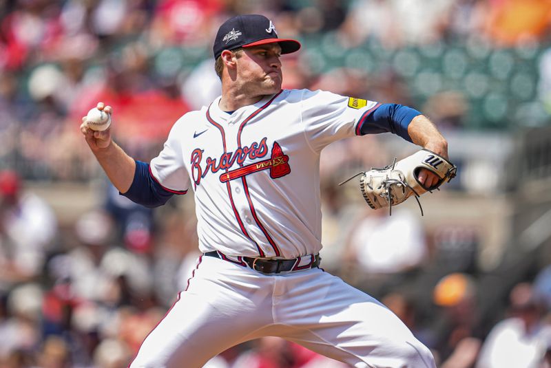 Apr 23, 2025; Cumberland, Georgia, USA; Atlanta Braves pitcher Bryce Elder (55) pitches against the St. Louis Cardinals during the first inning at Truist Park. Mandatory Credit: Dale Zanine-Imagn Images