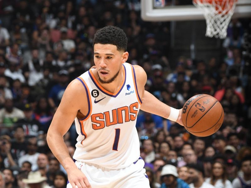 LOS ANGELES, CA - APRIL 22: Devin Booker #1 of the Phoenix Suns dribbles the ball during Round One Game Four of the 2023 NBA Playoffs against the LA Clippers on April 22, 2023 at Crypto.Com Arena in Los Angeles, California. NOTE TO USER: User expressly acknowledges and agrees that, by downloading and/or using this Photograph, user is consenting to the terms and conditions of the Getty Images License Agreement. Mandatory Copyright Notice: Copyright 2023 NBAE (Photo by Andrew D. Bernstein/NBAE via Getty Images)