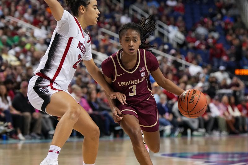 Mar 9, 2024; Greensboro, NC, USA; Florida State Seminoles guard O'Mariah Gordon (3) drives around NC State Wolfpack guard Madison Hayes (21) during the second half at Greensboro Coliseum. Mandatory Credit: David Yeazell-USA TODAY Sports