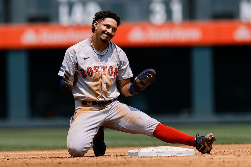 Jul 24, 2024; Denver, Colorado, USA; Boston Red Sox shortstop David Hamilton (70) reacts after being tagged out trying to steal second in the third inning against the Colorado Rockies at Coors Field. Mandatory Credit: Isaiah J. Downing-USA TODAY Sports