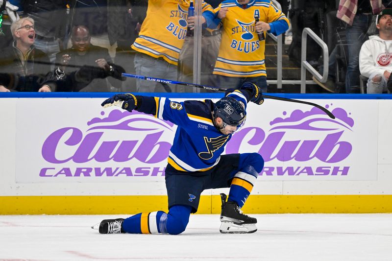 Dec 12, 2023; St. Louis, Missouri, USA;  St. Louis Blues defenseman Marco Scandella (6) reacts after scoring against the Detroit Red Wings during the second period at Enterprise Center. Mandatory Credit: Jeff Curry-USA TODAY Sports