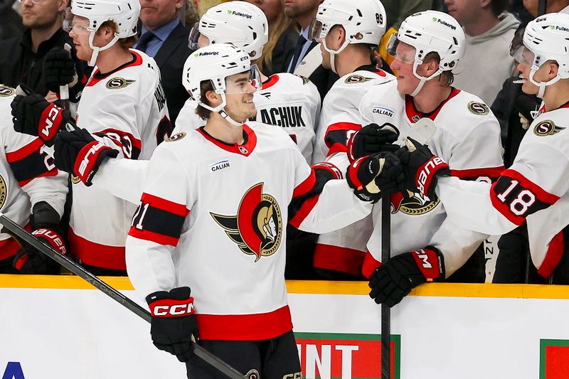 Jan 22, 2026; Nashville, Tennessee, USA;  Ottawa Senators center Ridly Greig (71) celebrates with teammates after scoring a goal against the Nashville Predators during the first period at Bridgestone Arena. Mandatory Credit: Steve Roberts-Imagn Images