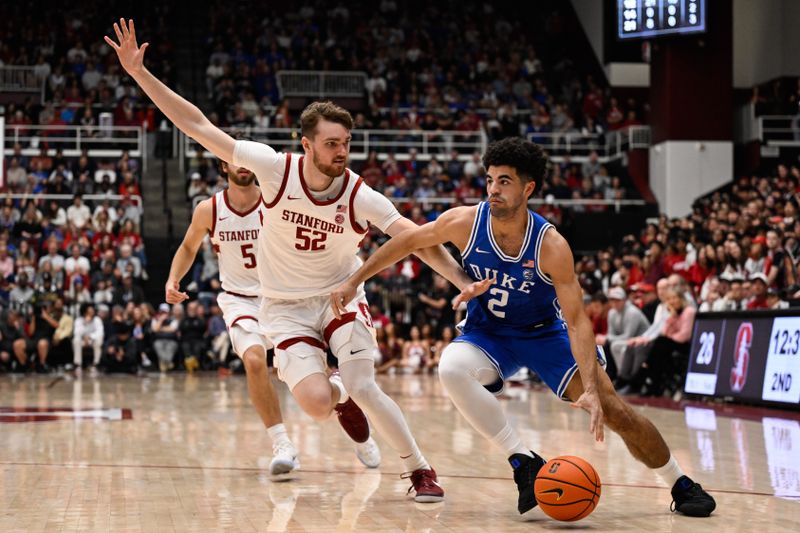 Jan 17, 2026; Stanford, California, USA; Duke Blue Devils guard Cayden Boozer (2) dribbles against Stanford Cardinal forward Aidan Cammann (52) in the second half at Maples Pavilion. Mandatory Credit: Eakin Howard-Imagn Images