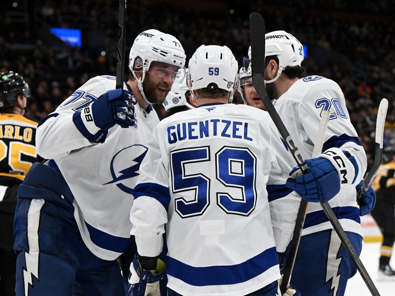 Jan 14, 2025; Boston, Massachusetts, USA; Tampa Bay Lightning defenseman Victor Hedman (77) celebrates with his teammates after scoring a goal against the Boston Bruins during the second period at the TD Garden. Mandatory Credit: Brian Fluharty-Imagn Images