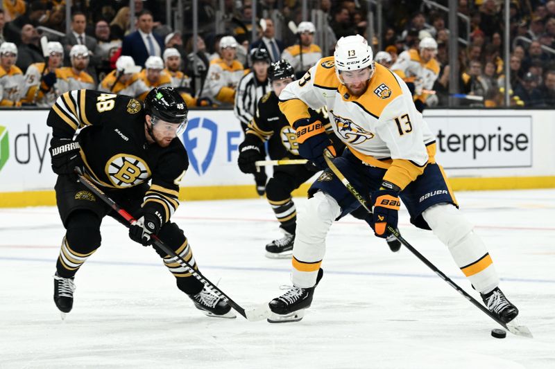 Oct 14, 2023; Boston, Massachusetts, USA; Nashville Predators center Yakov Trenin (13) skates against Boston Bruins defenseman Matt Grzelcyk (48) during the third period at the TD Garden. Mandatory Credit: Brian Fluharty-USA TODAY Sports